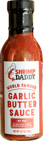 A bottle of Shrimp Daddy's world famous Garlic Butter Sauce